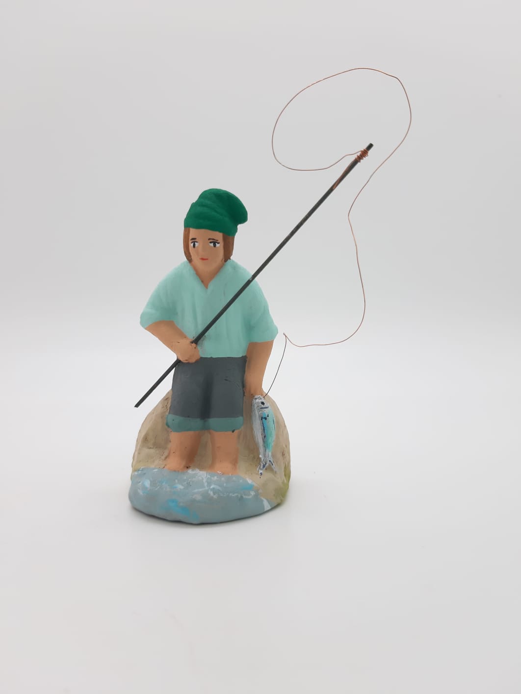 Pêcheur Assis